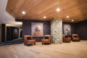Cozy hotel lobby with animal art and comfortable seating