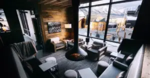Cozy lounge with fireplace and mountain view at Everwild resort